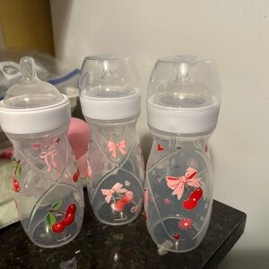 Playtex Baby Bottles with Pink and Red Designs